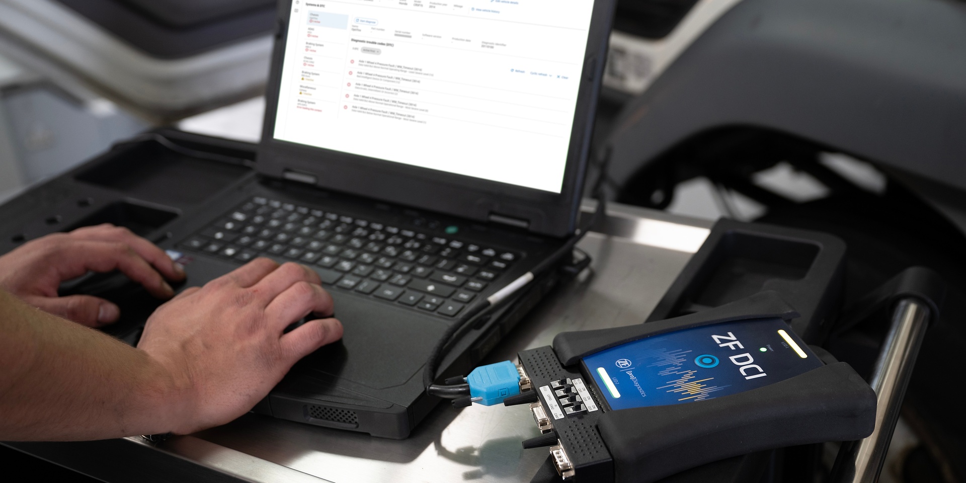 Image of a laptop showing the interface of ZF Scan