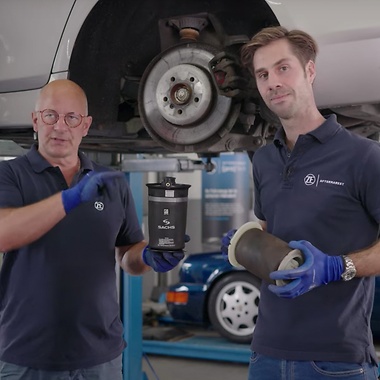 Philipp and Mathias with used and new air springs