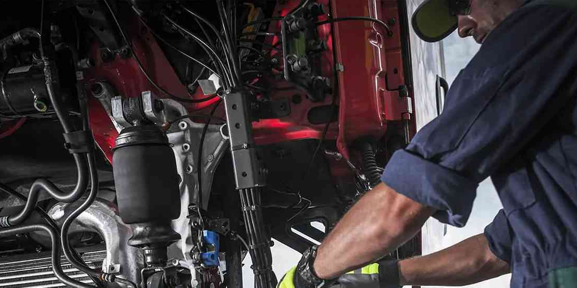 mechanic working on a truck 