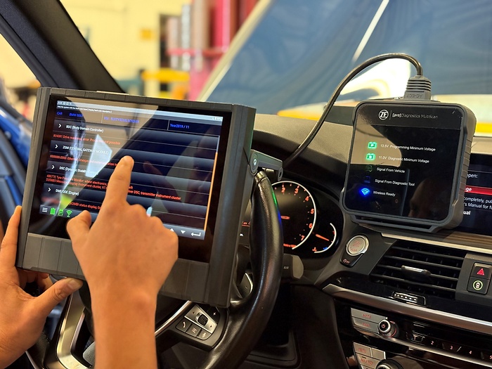 Diagnostics tool inside of passenger car