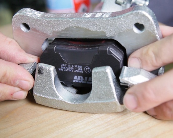 Inserting the pads before installing the caliper