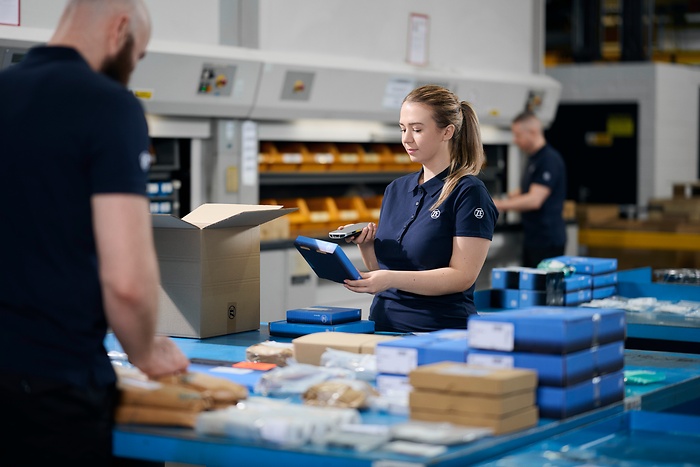 employee is scanning an item