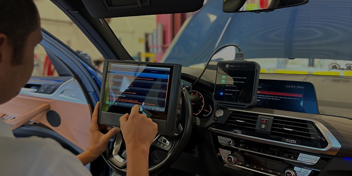 Driver checking on screen.