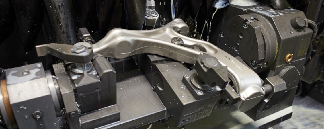Machining of housings for aluminum control arms