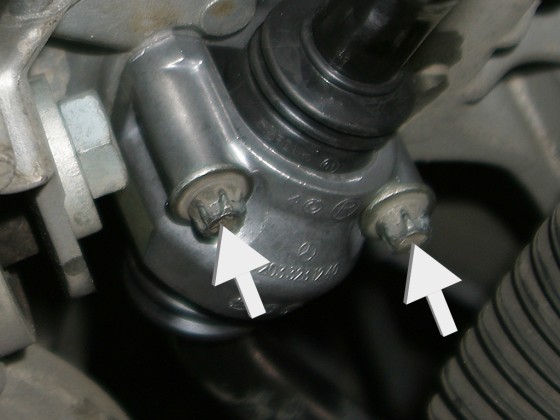 Tighten the bolts on the mount cover with the specified torque